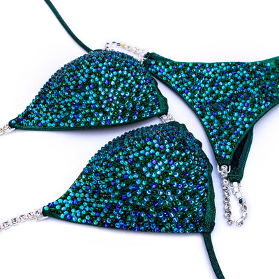 Capri Blue Burst on Emerald Competition Bikini | OMG Bikinis